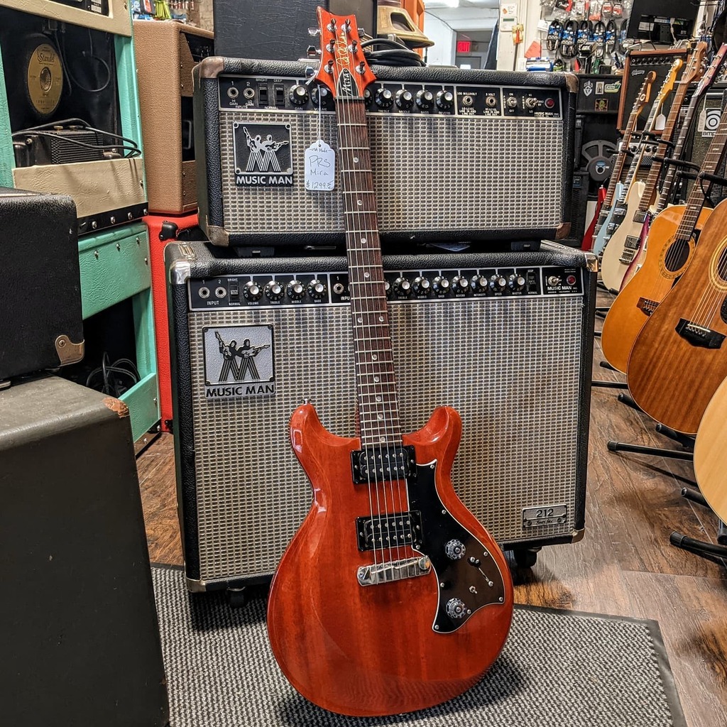 LoveofFuzz1's tweet photo. PRS isn't my immediate go-to for old school rockers - BUT the old USA made Mira's absolutely fit the bill. Right now we have an '08 all mahogany, humbuckers, and weighs under 7bls. Plug it into a cranked it and it'll come alive. $1299 takes it home 🤙… https://t.co/ESrNXKgqcz https://t.co/3UQtDFFYPW