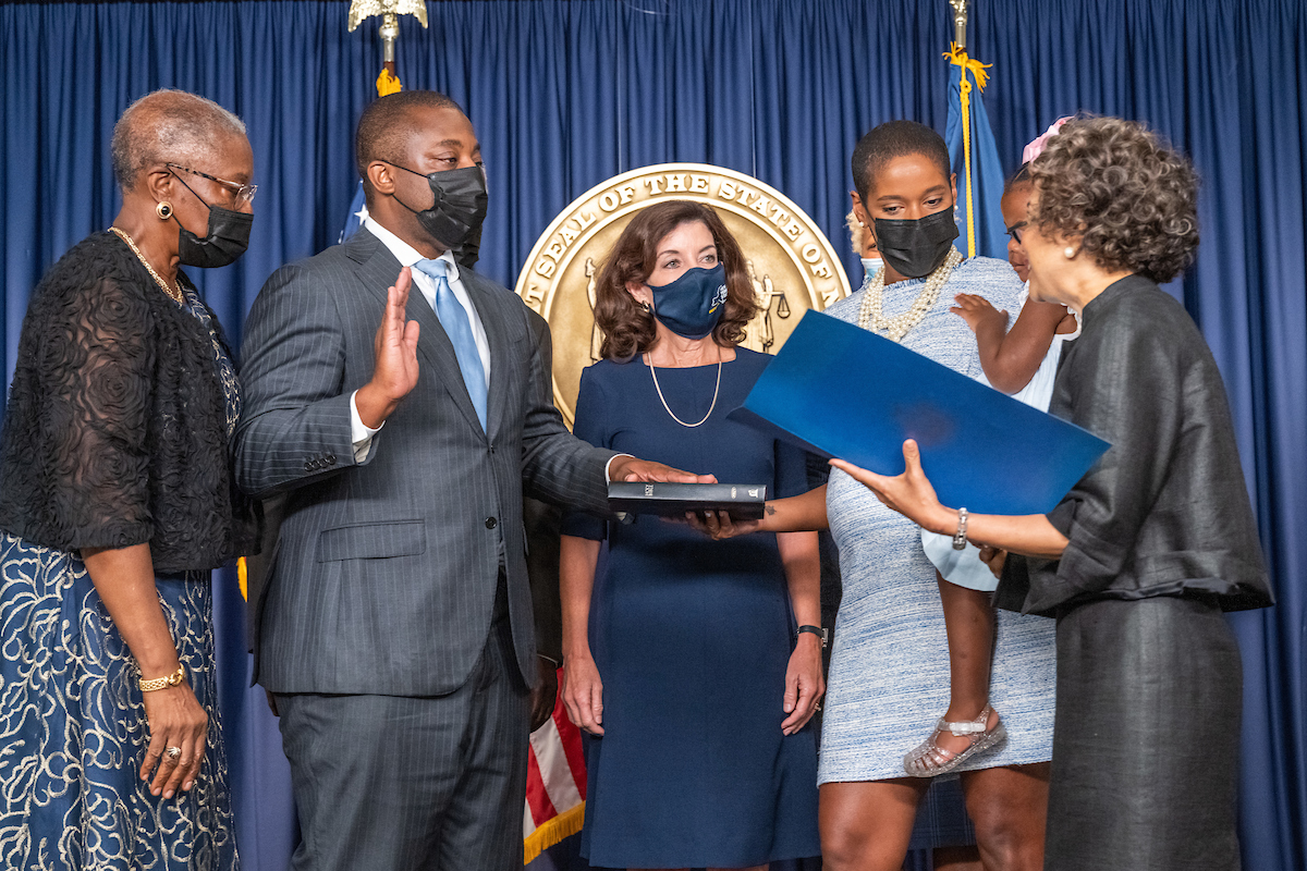 Governor Hochul (center) stands with Lieutenant Governor Brian Benjamin and family members during swearing-in ceremony