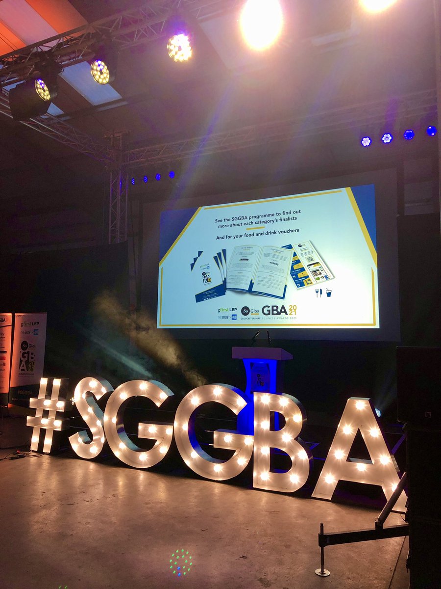 How awesome does our stage look? 😍 Our event partners @oasisevents and @SLXmedia have done an incredible job - lots of compliments on our unique venue at @WestonAviation’s hangar at @GlosAirport too! Not long now until we start the awards! #SGGBA