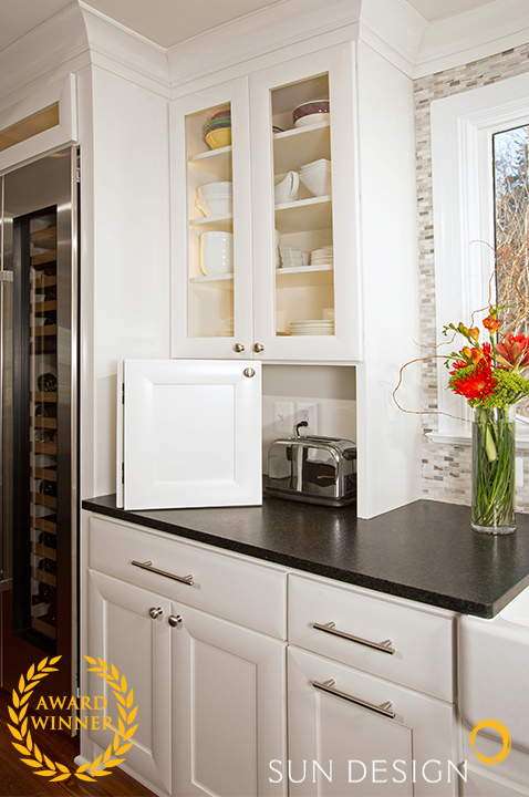 How do you marry one's passion for cooking and entertaining? Keeping the chef front and center allows this client to juggle cooking while still being engaged with family.

View our portfolio of more before/after pics of this Galley Style Done Right: sundesigninc.com/portfolio/kitc…