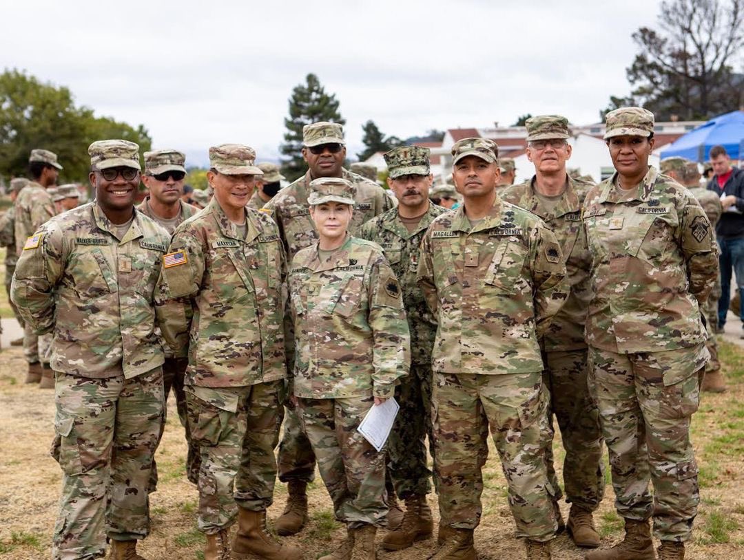 Newly Commissioned Officers pose with Command Chief Lori Sandes in celebration of their graduation from California State Guard Officer Candidate School.
(California State Guard photo by 2LT Sal W. Hanna.)