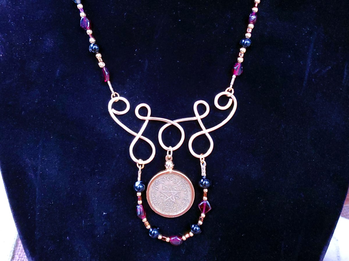 Another quick snapshot of new piece. Morocco coin. The coin is actually gold colored. It's a lousy photo. =) Professional ones should be coming soon. Currently $95, although I may be rethinking prices and increasing it in the future. (So grab it while you can!)