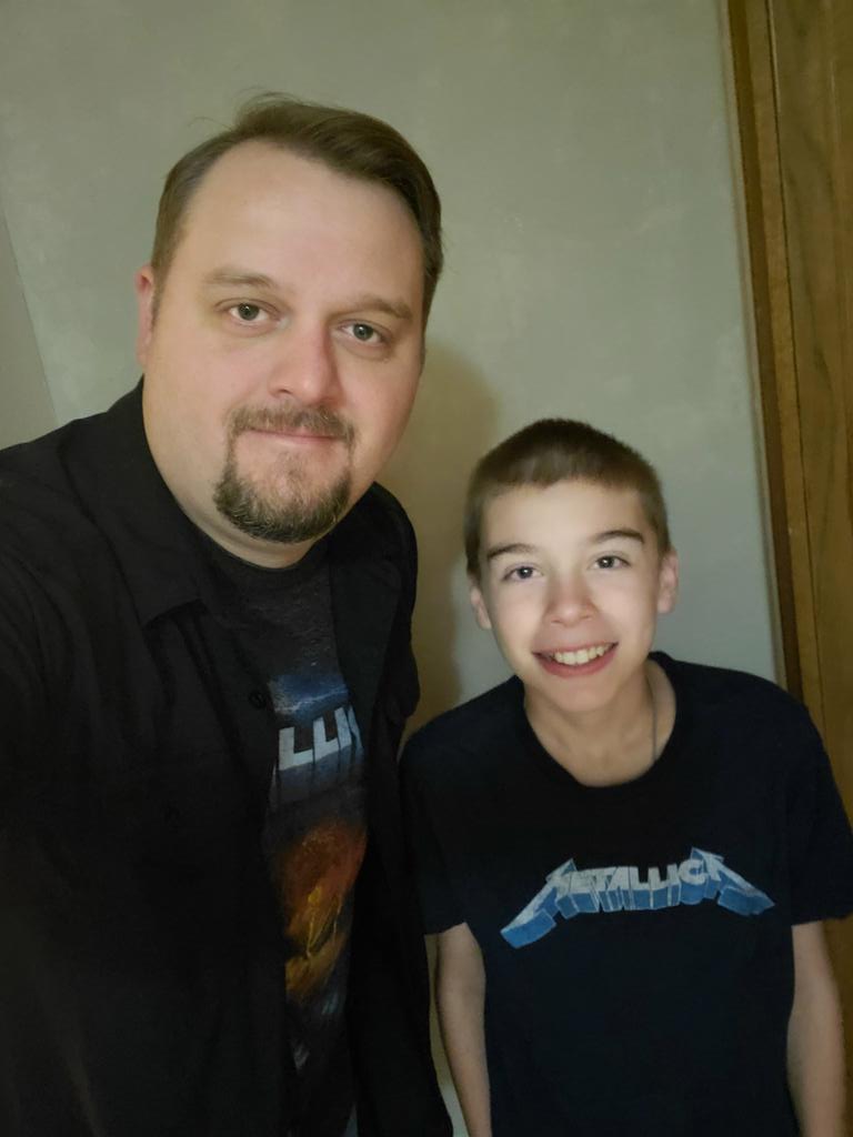 condonsean's tweet photo. Celebrating 30 years of the #BlackAlbum.  Metallica shirts under our work and school uniforms  for me and the little man today. #MetallicaTShirtDay #BlackAlbum2021 https://t.co/YD1MbEW3nI