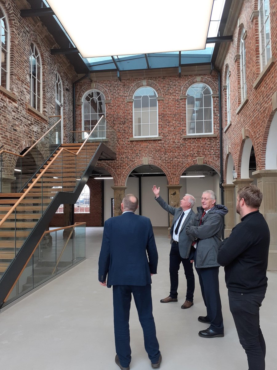 In the restored courtyard of the First White Cloth Hall in Leeds today with <a href="/hilarybennmp/">Hilary Benn</a>. Hard work by Mark from <a href="/RushbondPLC/">Rushbond</a> and Adam from <a href="/hhsmithbuilders/">H.H. Smith & Sons</a> has saved this amazing place, with support from <a href="/HistoricEngland/">Historic England</a>, <a href="/HeritageFundNOR/">The National Lottery Heritage Fund North</a> and <a href="/LeedsCC_News/">Leeds Council News</a>.