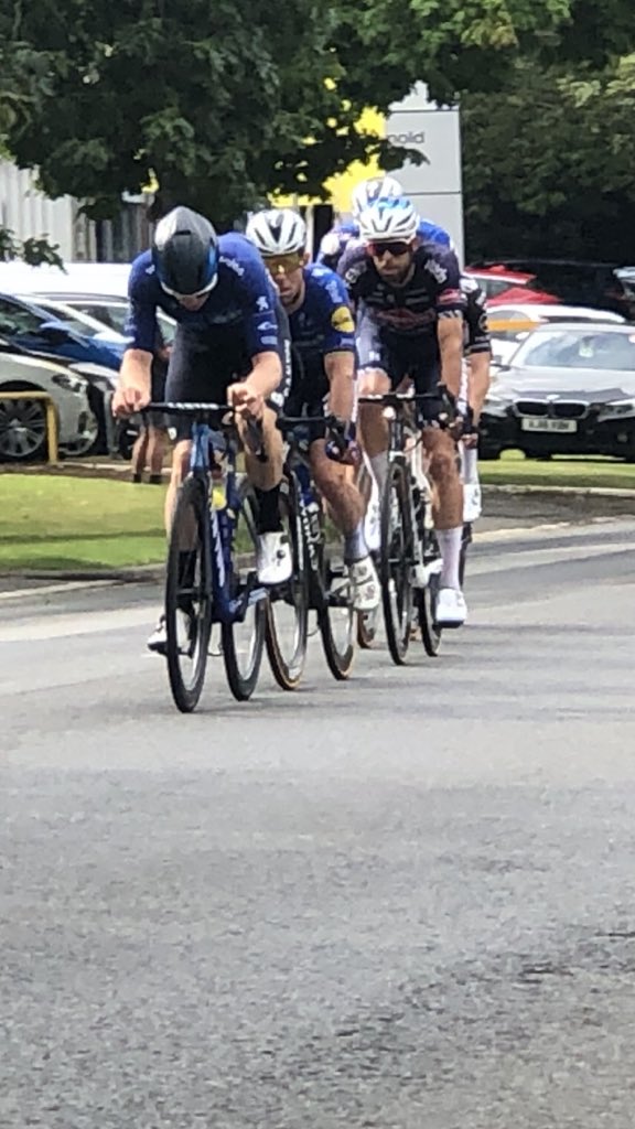 Dr_PaulWatson's tweet photo. @TourofBritain absolutely amazing riding by all.
@MarkCavendish giving me a cheeky wink (under his glasses of course 🤣) reading my @GoZwift TTT team banner. Good riding pal. #Valhalla #teamGram #TourofBritain2021 https://t.co/c9SjPHTmOd