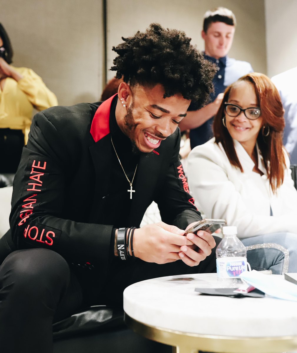 greg newsome on draft night, smiling after he recieved the news of becoming a first round pick.