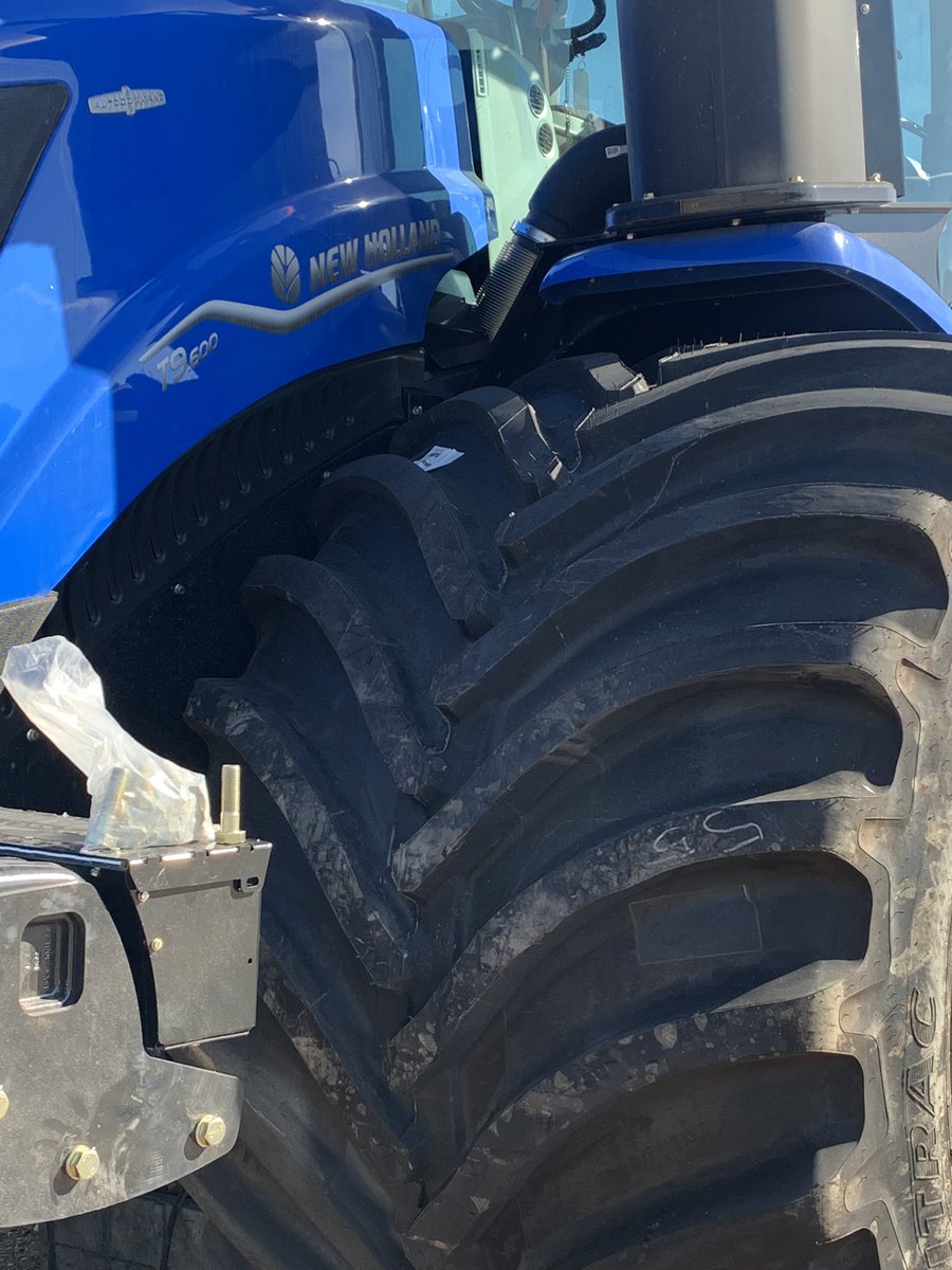 maudea2's tweet photo. Big Boots getting bolted on the @NHAgriculture T9.600 AutoCommand @DLEequipment in #GPAB today!!! Can’t wait to get it in the field next week!!! Thanks to #FountainTire North GP for supplying and installing these @GoodyearFarm #LSW1400’s!! https://t.co/aB6pFkFs2T