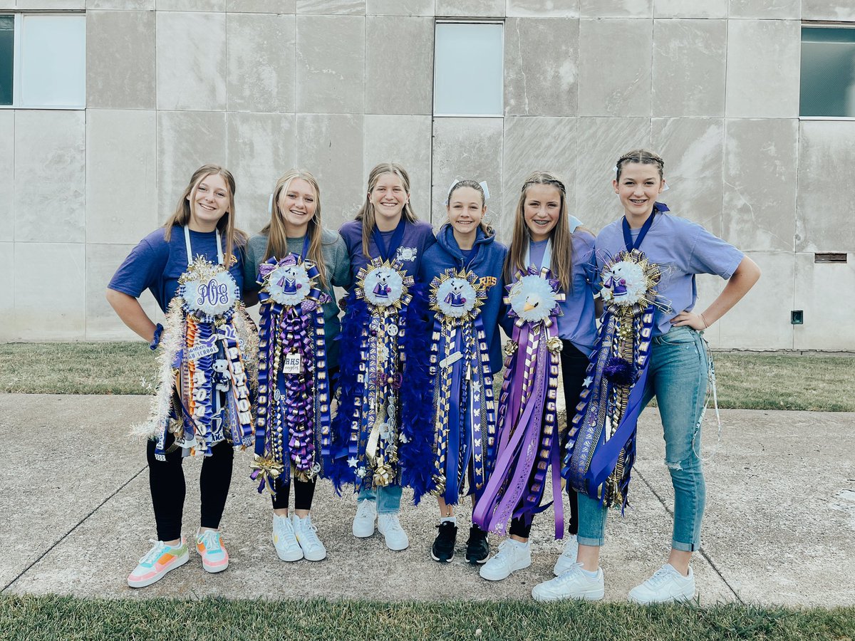 Freshman cheerleaders showing off those classic Texas mums!! #risdpoweroflove