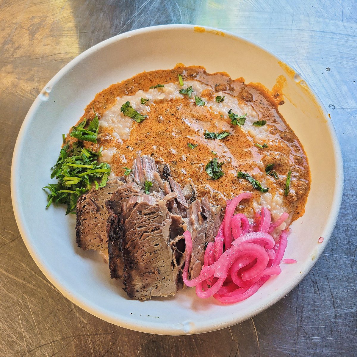 Tonight's special! 

[ Briskets &amp; Gravy ] hand ground freshly nixtamalized heirloom corn grits, chorizo sawmill gravy, pickled red onions, cilantro, and brisket from the absolute KING of Memphis Brisket, Bain Barbecue
