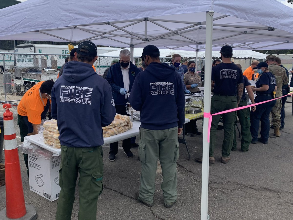 TMFPD's tweet photo. We appreciate the opportunity to have lunch served by @GovSisolak and recognized for the wildland fuels reduction work that we and so many NV fire crews have performed to reduce the #wildfire threat. Thank you Governor! 🚒 #CaldorFire #TamarakFire https://t.co/oDP5G8IGjx