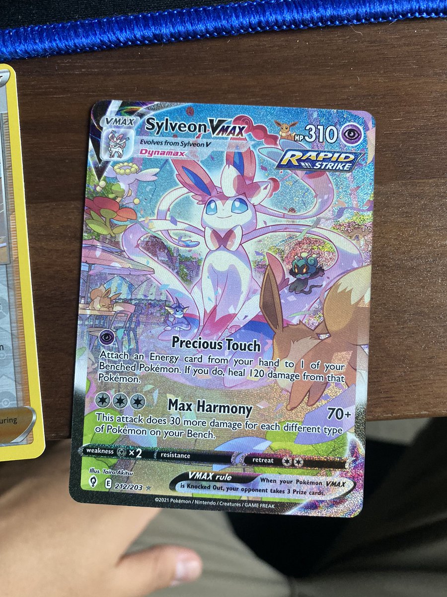 TheMachoManMG's tweet photo. Something in my bones told me to get Pokémon cards after work. Ended up pulling a decently expensive sylveon 🥲 https://t.co/2Y73AeGF0Y