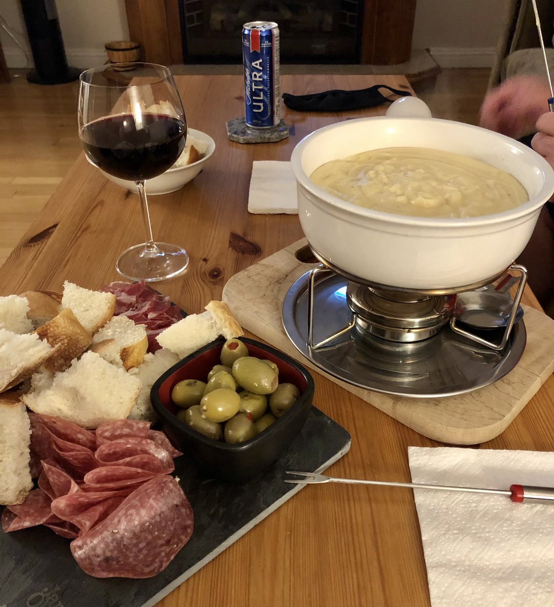 Our meal while we hunker down and wait for #Larry to pass by  #cheesefondue #wine #nlwx