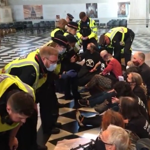 HollyAPetersen's tweet photo. Around 2k years ago Jesus threw money lenders out of the Temple in a powerful act of protest, for which he was arrested

Today the CofE is lending money to fossil fuel companies - investing in their destruction of God's creation

Christians protesting this yesterday were arrested https://t.co/RdwvaVoSsp