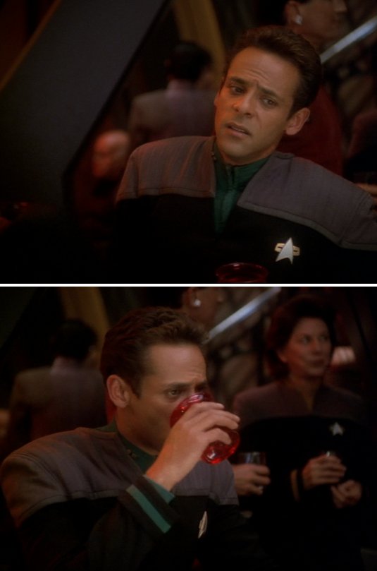 two still images stacked vertically. julian bashir is sitting on a barstool in Quark's bar, silently reflecting with a concerned, downward cast expression. his shoulders are facing the left while his gaze is directed to the bottom right. In the second frame, Bashir is looking to the right with a sullen gaze, his shoulders rotated to face the right of the frame, and he is taking a drink. 