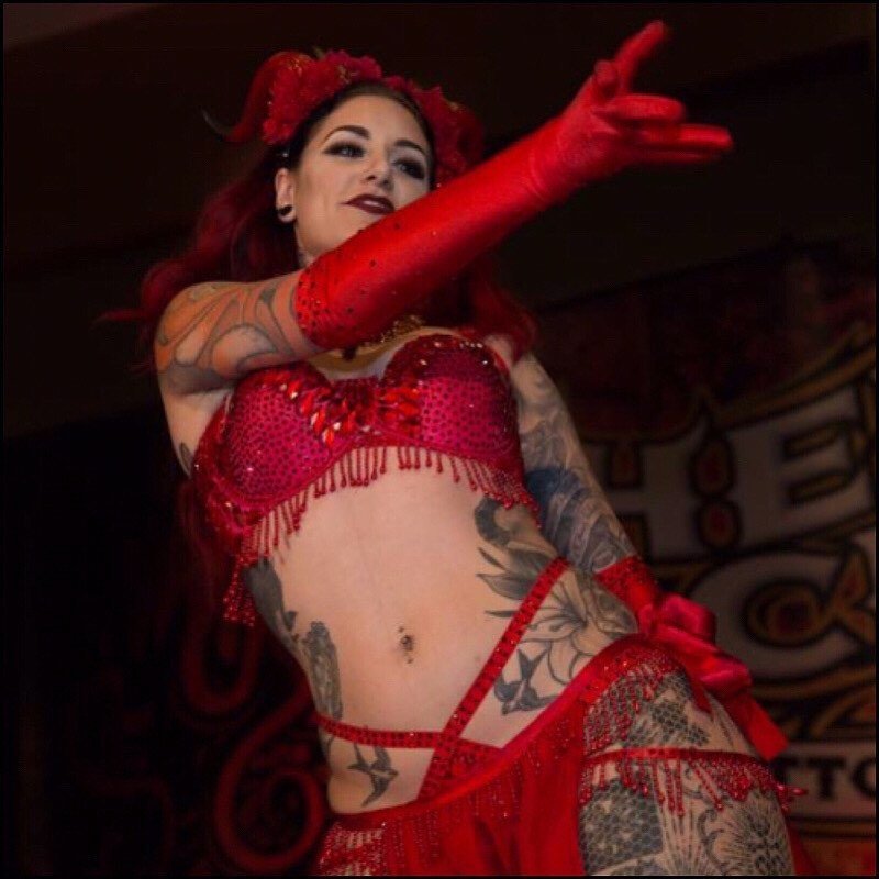 HellCity's tweet photo. @cervenafox performed her "Demon" burlesque act all 3 nights on the MainStage at Hell City Columbus 2017! 
Cervena's burlesque show is set to “Judith” by Perfect Circle and features spinning fabric fans, mimicking fire, during this belly dancing-burlesque fusion performance. https://t.co/sdngG3y4og