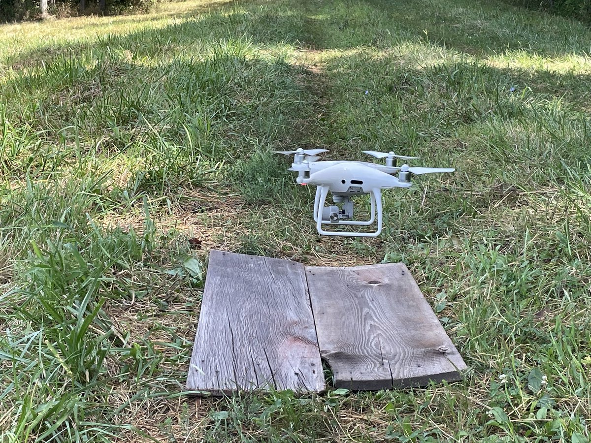 agronomymatt's tweet photo. David Kleinsorge flying a soybean fungicide strip trial near Union last week.  Strip trials allow farmers to evaluate treatments in a replicated study.  The landing pad for the drone are boards from a 120 year old barn on David’s family farm.  #ExtendMU #2xAg2030 https://t.co/7cF43pRLzO