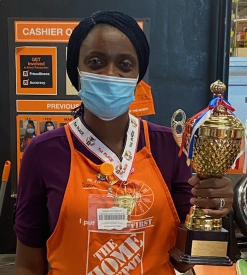At West Frederick Home Depot store 2511 we had a Credit contest.
The winner is Dorothy Cato with 138 credit cards opened in the past 3 months!!   She is holding her engraved trophy!!