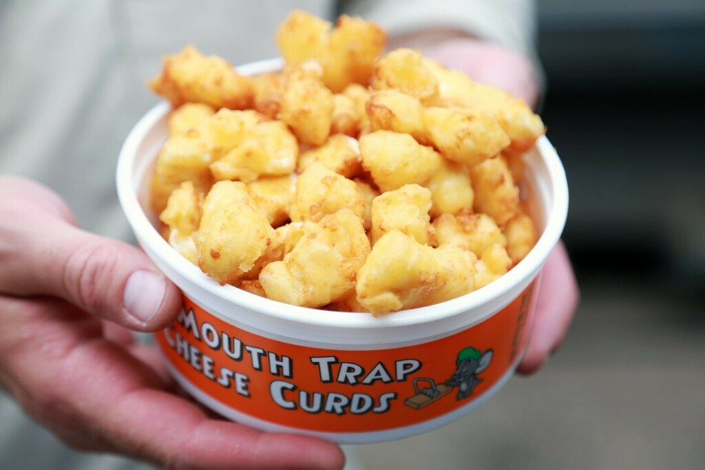andrewzimmern's tweet photo. This week, I'm going to take you on a tour of some of my favorite foods at the Minnesota State Fair... our first stop is Mouth Trap Cheese Curds. What makes their product so perfect? Ellsworth cheese curds, fresh from the creamery, delivered daily—a tota… https://t.co/XdRKh76HOW https://t.co/QML3u7KQad