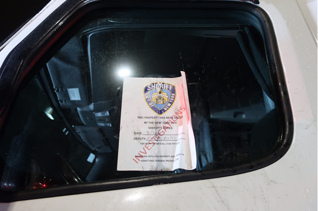 NYCSHERIFF's tweet photo. Last night deputy sheriffs continued operation "CON- TEMPORARY" with officers from @NYPD112Pct in a joint operation. Illegally parked tractor trailers &amp; tractor trailers with illegal paper plates were seized from Horace Harding Expressway between 99 St. &amp; 102 St🛑 https://t.co/Ht2mvHNwtU