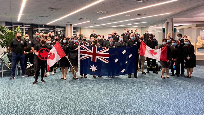 NSWRFS's tweet image. Moments ago our Australian firefighters landed back safely in #Sydney. The crew were deployed in late July to assist with fires burning in #Canada. Welcome home team, now to just get through 14 days of #Quarantine. 😁