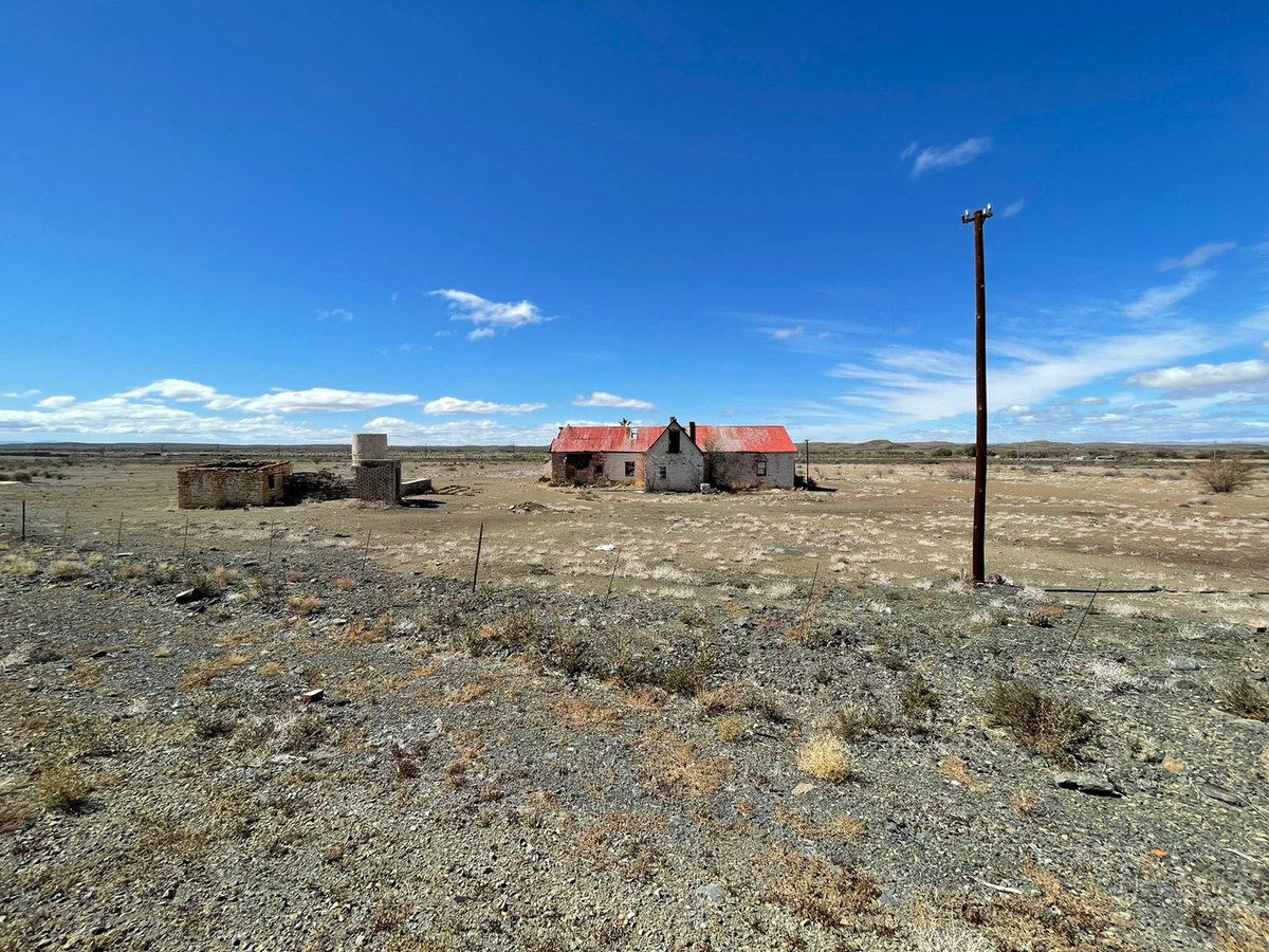 Plaas Huis. Farm House. 72km before B/West.  My thoughts are about imaging when it was first built. How new it was. The first night the family spent in it. Now it’s abandoned.  Democracy’s journey. 
#RoadTripConversations 
#PadlangsPraatjies 
#TheJusticeDialogues