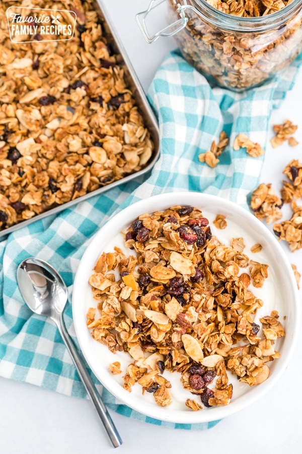 This Homemade Granola is full of oats, nuts, and dried fruit. It is much better than store bought granolas. Serve it with milk or yogurt for a delicious breakfast! #raisins #oats #granola #homemadegranola #snack #yogurt #breakfast
⁠
favfamilyrecipes.com/elises-homemad…