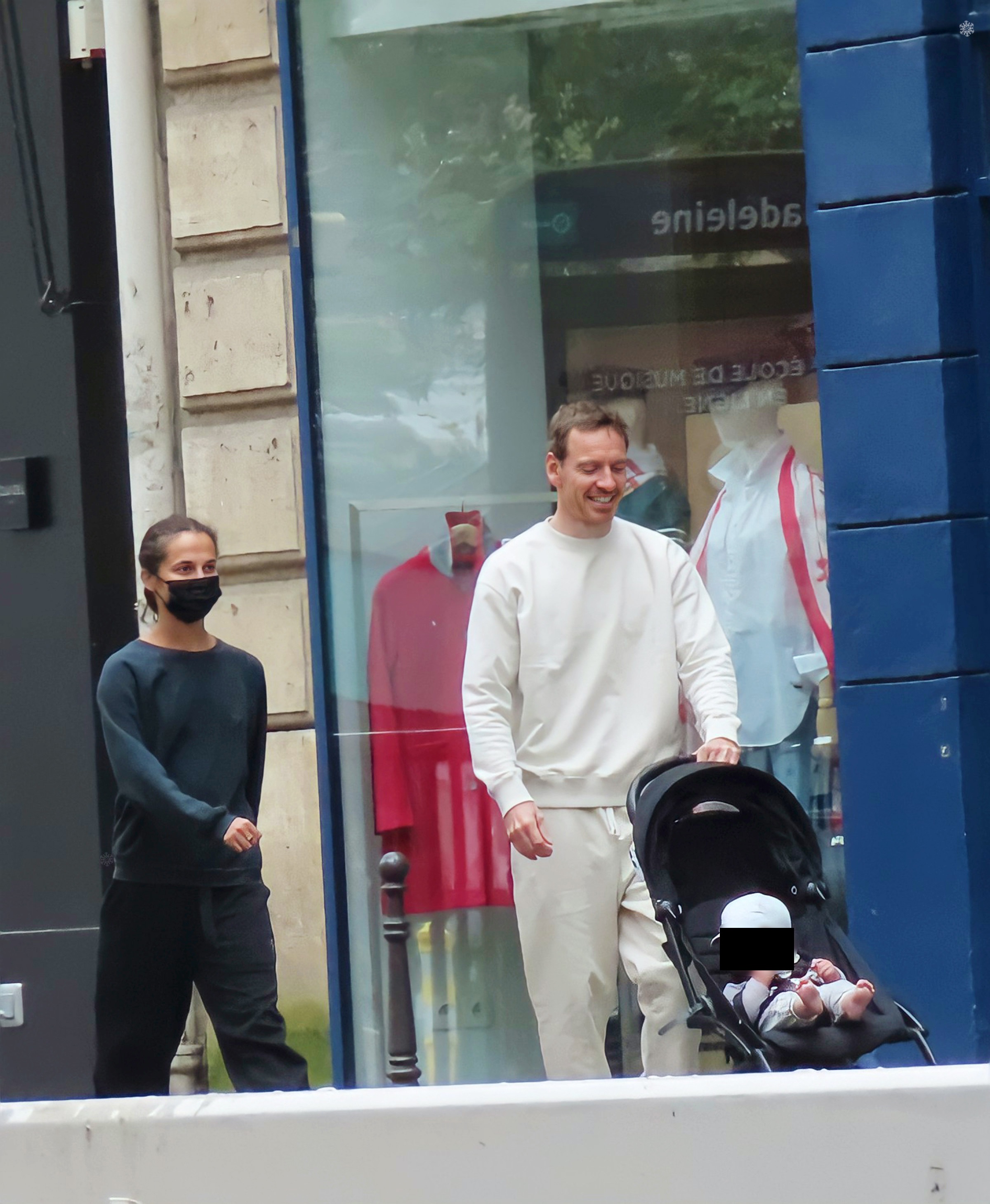 Alicia Vikander and husband Michael Fassbender seen with baby in buggy