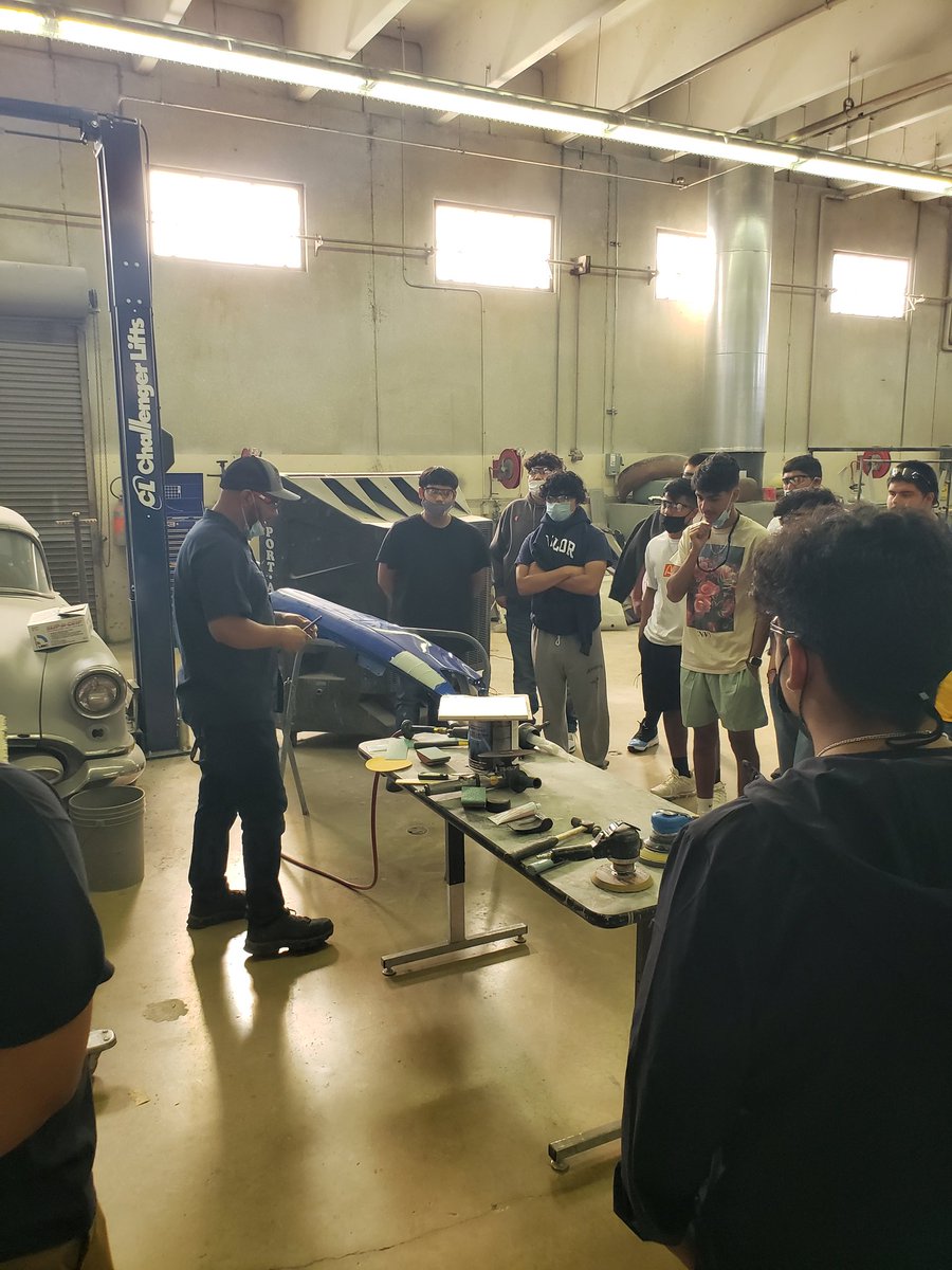 Mr Gonzales gives instructions to his Collision Repair class.
