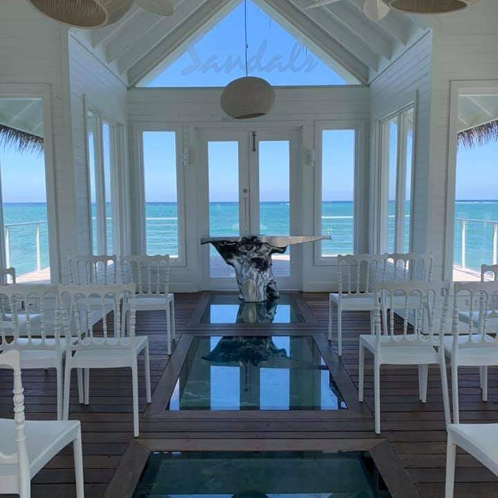 Over the water wedding chapel at Sandals Montego Bay
#kourtneyspixievacations #customizableweddings #sandalsresortswedding #weddinginparadise