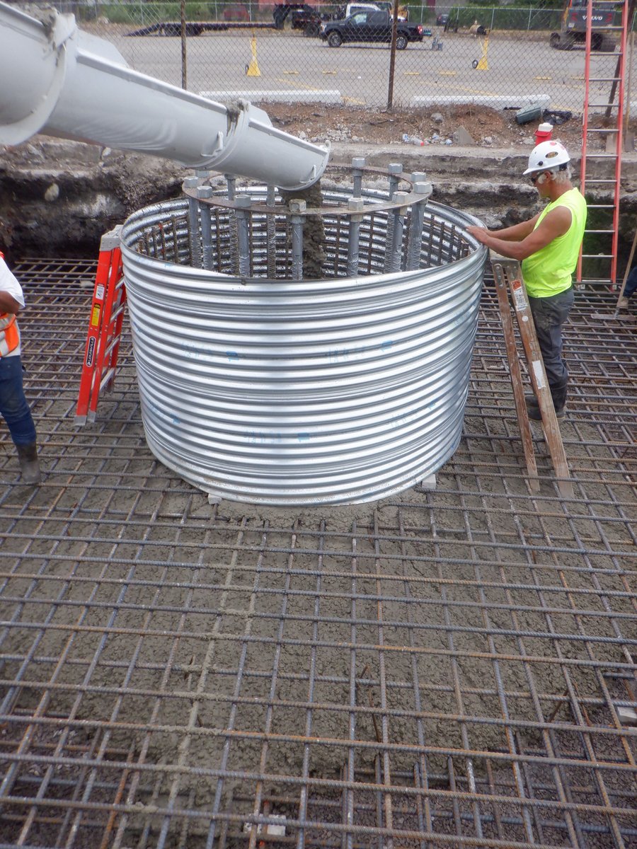 G2_Consulting's tweet photo. The magic behind installing a pad and pier foundation for a 130-foot monopole tower ✨ Excavate the mat foundation, place the steel reinforcement for the mat and center pier, pour the concrete &amp; let it cure. 

#pierfoundation #excavate #monopoletower #towerconstruction #concrete https://t.co/bOB8MbS8mY