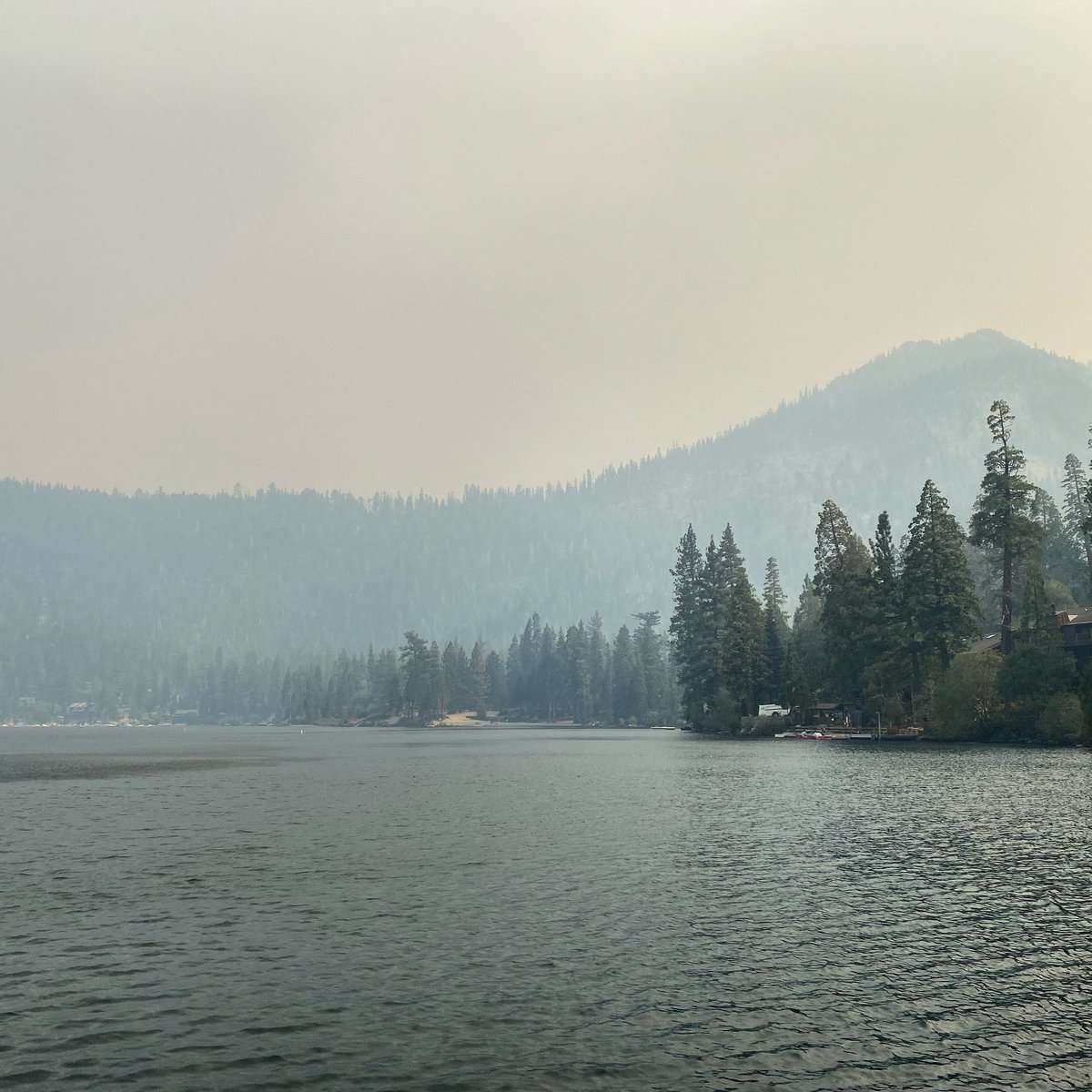 TallacAttack's tweet photo. Current conditions at #FallenLeafLake #CaldorFire. Smoke, but no fire yet on our side of this. https://t.co/loSUUt3EI2