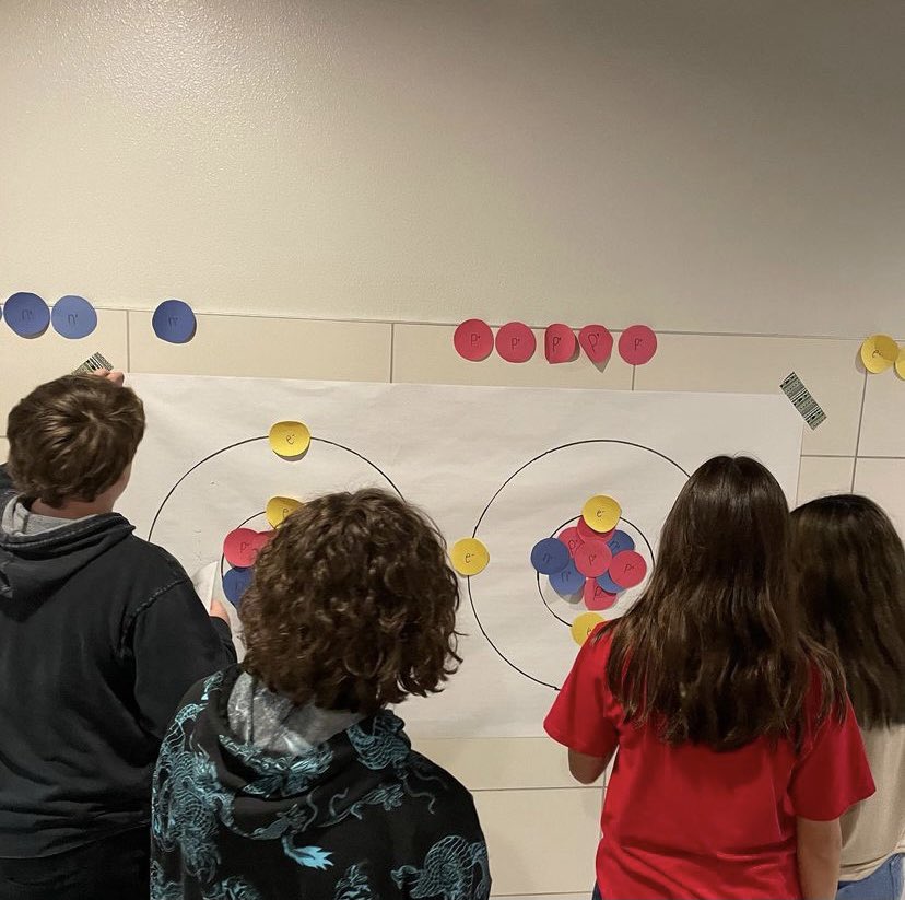 STEAM_MS's tweet photo. mrs.lentz_steam_ It is so refreshing as an educator to witness those lightbulb moments. An activity as simple as building atoms in the hallway has excited students, and I am so proud of their collaboration!❤️ @repost #steamexperiments #steamscience #steamlearns https://t.co/BX8Ojr1J4t