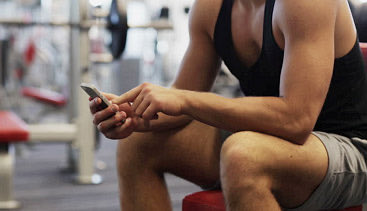 Back in the day…

We did something called “working in”.  Meaning if someone was waiting for a machine while you were resting, you let them do their set. 

You didn’t sit there, play on your phone and do two half hearted sets in ten minutes like you owned the machine.