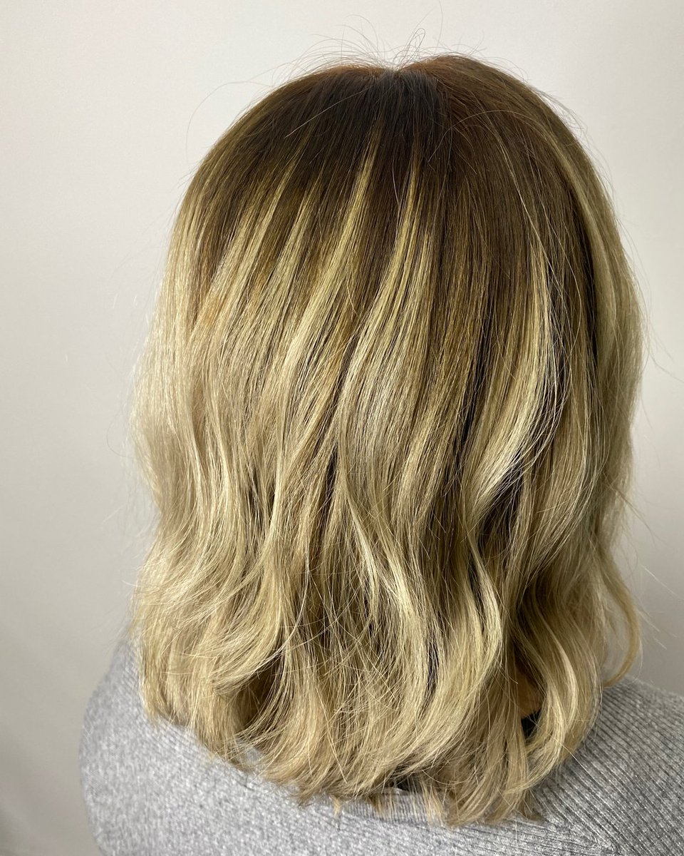 TONE IT DOWN... Going from white to a lovely warm blond can be scary, but Nick smashed it with this beautiful guest. I love this more sophisticated look. 
STYLIST: Nick B