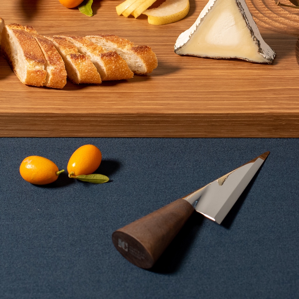 The Arbor Cheese Knife and Zen Serving Board. Designed as a functional piece of art. #cheeseknife #charcuterie #charcuterieboard #cheeseboard #cheese #grazingboard #plattersoftheworld #plattergoals #knife #design #cheftools #cutlery #tableware #industrialdesign #photograph