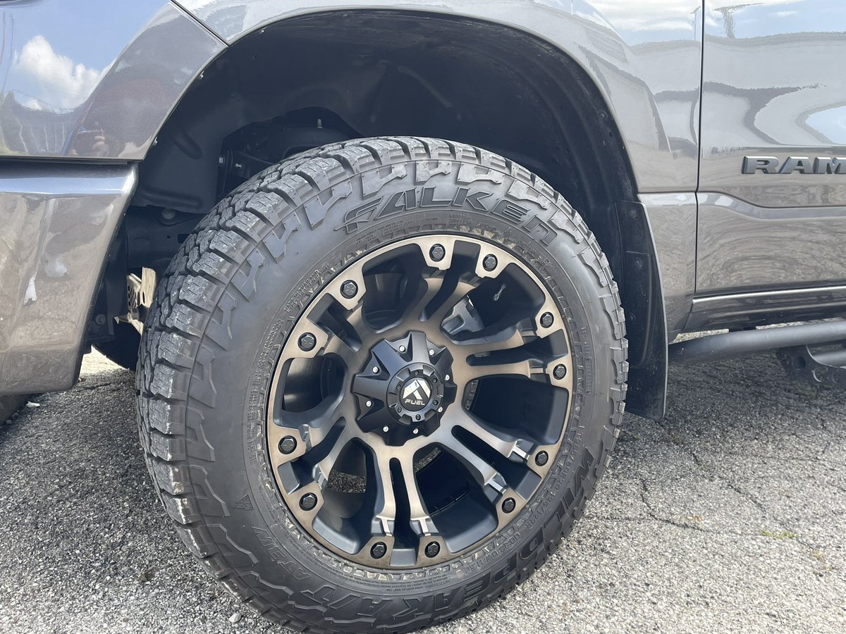drainthebrain87's tweet photo. @FuelOffroad 20x10 -19mm offset dark tinted Vapor wheels with the @FalkenTire wildpeak at3w rubber (285/60r20). Looking real good on my @RamTrucks 1500 with the 2” @OfficialMOPAR lift. https://t.co/OhxRkD5IBd