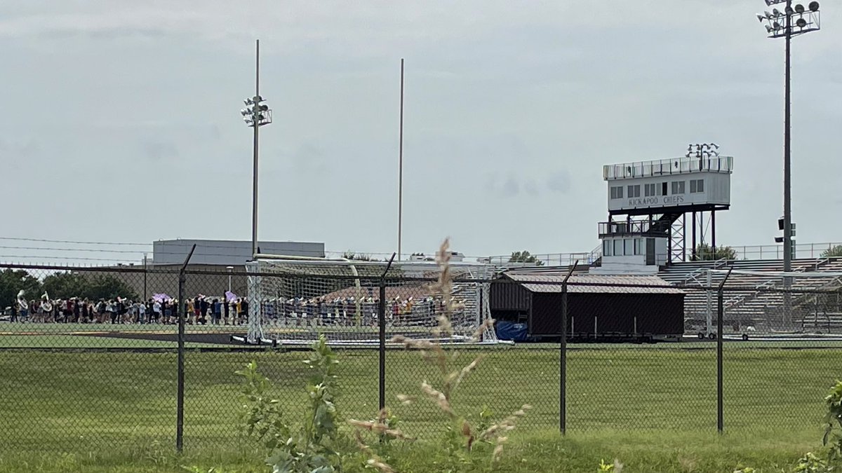 JasonLambTV's tweet photo. I spy - from my luxurious Springfield apartment 😆 - the Kickapoo marching band practicing in the afternoon heat for Friday night’s football home opener! @KickapooChiefs @Kpoofootball https://t.co/OA2KPs8SGX