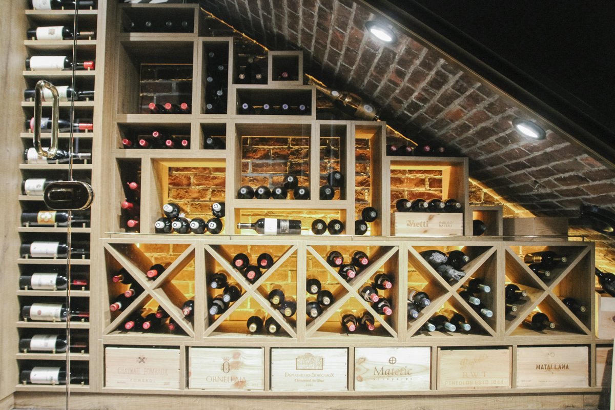 Check out our award winning wine cave! Enjoy 25% off all bottles of wine every Wednesday. #winespectatoraward #winewednesday #wine #winetime #redwine #whitewine #wineoclock #winelove #winning #bardandbanker