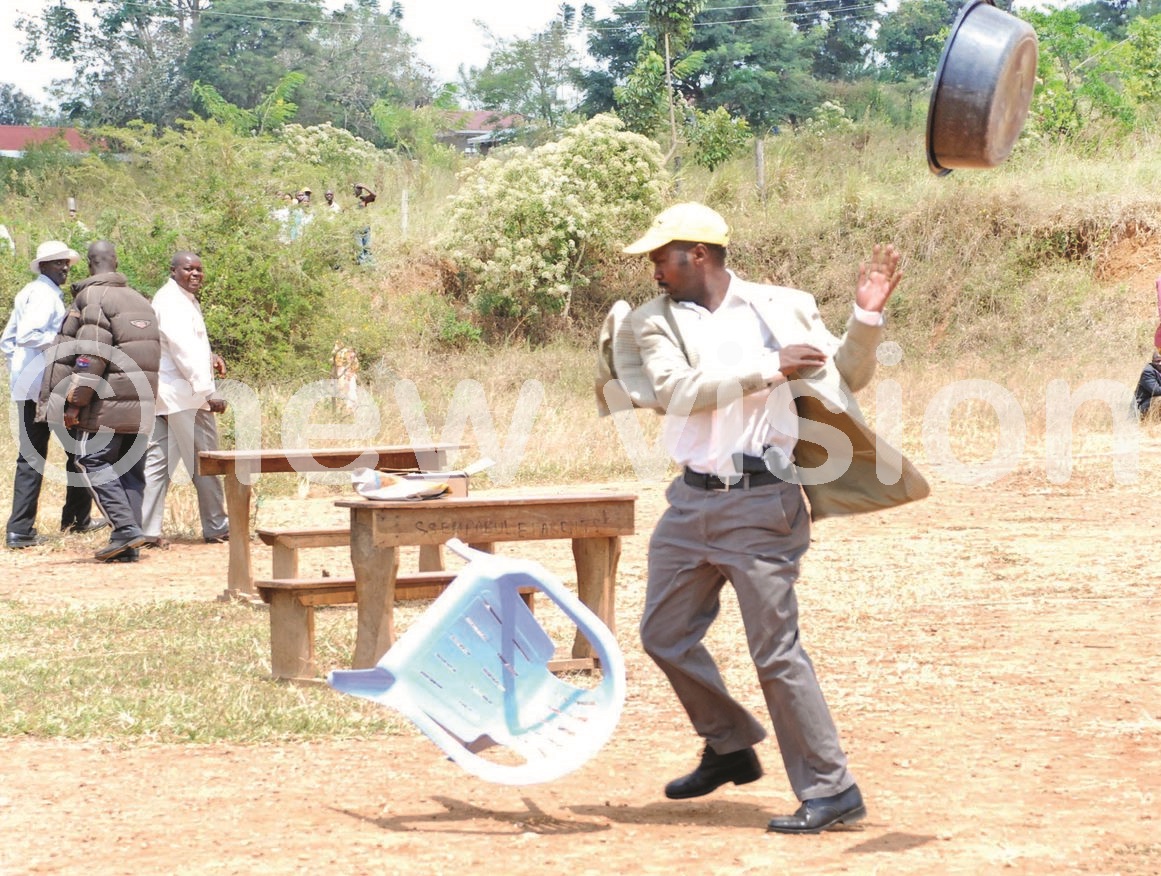 newvisionwire's tweet photo. #NewVisionXtra: In 2010, this Member of Parliament was pictured in electoral disruption and would later be charged with illegal possession of a firearm and injuring a person during the scuffle. 

What is the name of the MP and which constituency does he represent? #VisionUpdates https://t.co/3GPpjwL5RS
