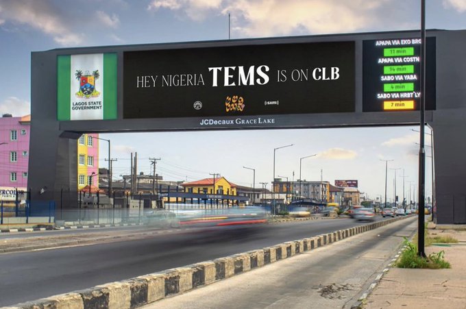 XONATION's tweet photo. Tems @Temsbaby collaboration announcement on Drake's new album, Certified Lover Boy #CLB. Billboard in Lagos. #Family #XONATION https://t.co/ztJw35lJuY