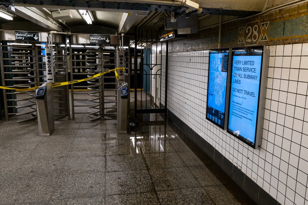 ajplus's tweet photo. At least 9 people died after the remains of Hurricane #Ida flooded NYC &amp; the surrounding area:

-NYC saw more rain Wednesday than in a month
-The National Weather Service issued NYC’s first flash flood emergency
-Subway service was suspended, travel ban issued until Thursday a.m. https://t.co/NrdNbC6dKQ