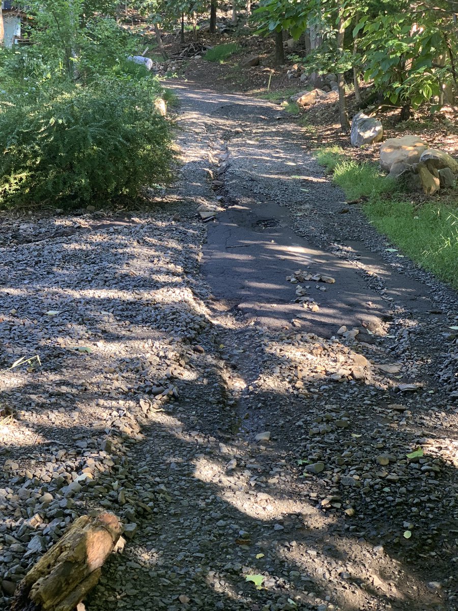 metznerwx's tweet photo. Some photos of the storm damage caused by #HurricaneIda . It’s like a new canal was cut through our driveway. A few houses experienced basement flooding and my backyard was also over saturated again https://t.co/HgFtexvIBa