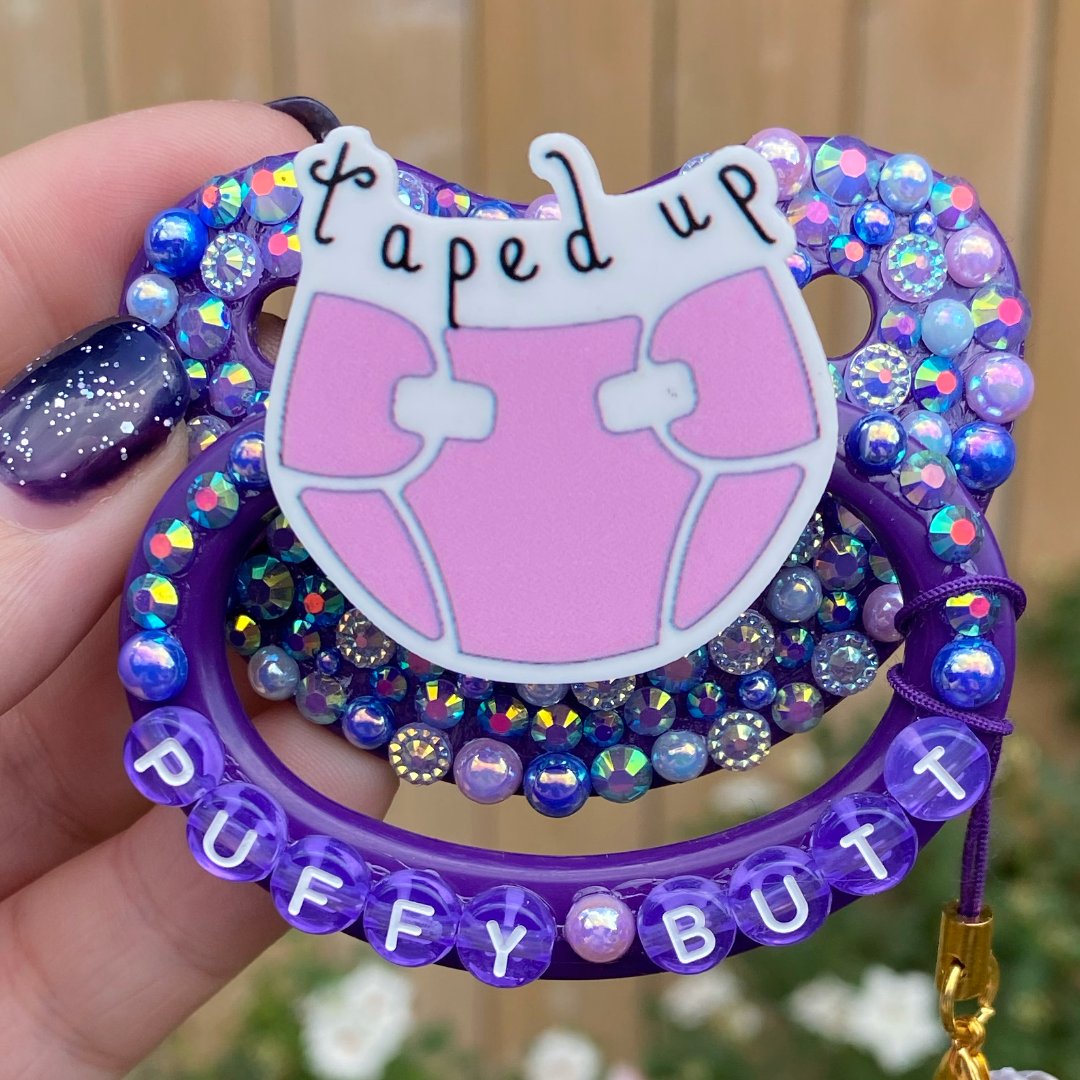 DaizeeOopsie's tweet photo. Check out our Taped Up paci - available in the shop tomorrow at noon.

#pacishop #adultpaci #adultpacifier #adultpaci  #decopaci #decopacifier #adultpacifiershop #adultpacishop #cutepacifier #littlespace https://t.co/fHJRXsZEn2