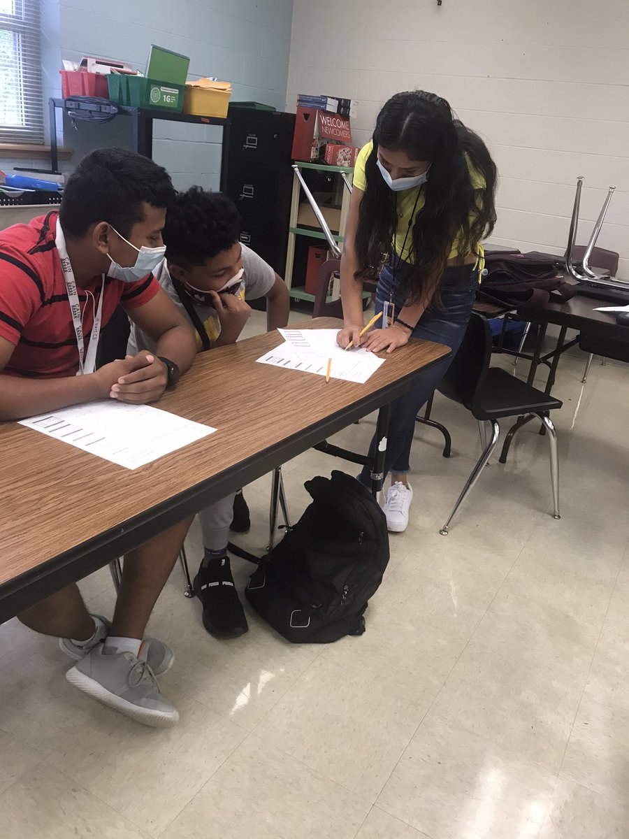 LoriPReed's tweet photo. Today is math day at the MFHS Newcomer Center!! Thank God for the veteran EBs who are helping tutor their new friends, because NO ONE wants me teaching math! My old-school form was quickly corrected. 🤣 ❤️my EBs #NewcomerCenter https://t.co/kFTsehgjtJ