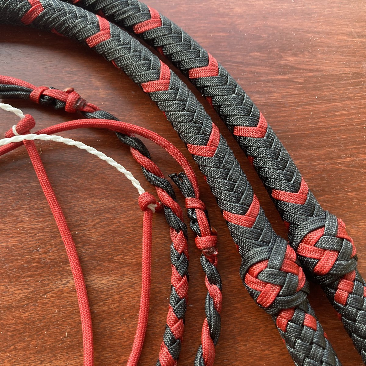A matched pair of 3 foot mini Economy Bull Whips in black and red. This pair has 6L5B heel knots and 5L4B transition knots with norton interweaves
.
.
#whip #whips #nylonwhip #torrancefisher #swordguybuilds #sgb #miniwhip #whipcracking