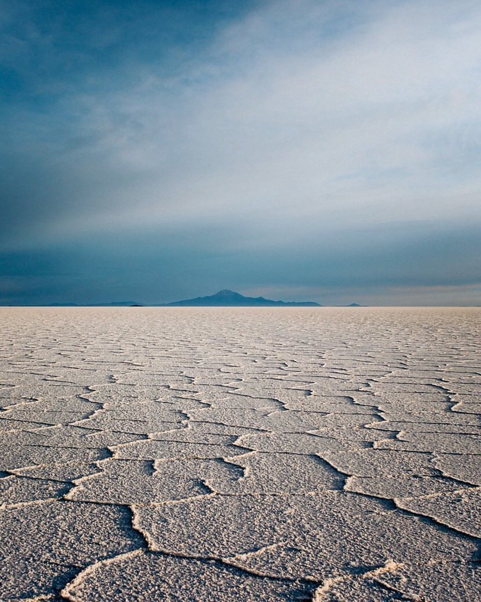 Karikuy's tweet photo. Salar de Uyuni is the worlds largest Salt Flat and is located in Bolivia. The extraordinary flatness of this ancient lakes also creates the worlds largest mirror when it rains. #explorebolivia #exploresouthamerica #travelbolivia #visitbolivia #boliviatravel #madeinbolivia https://t.co/kMIh77WBKj