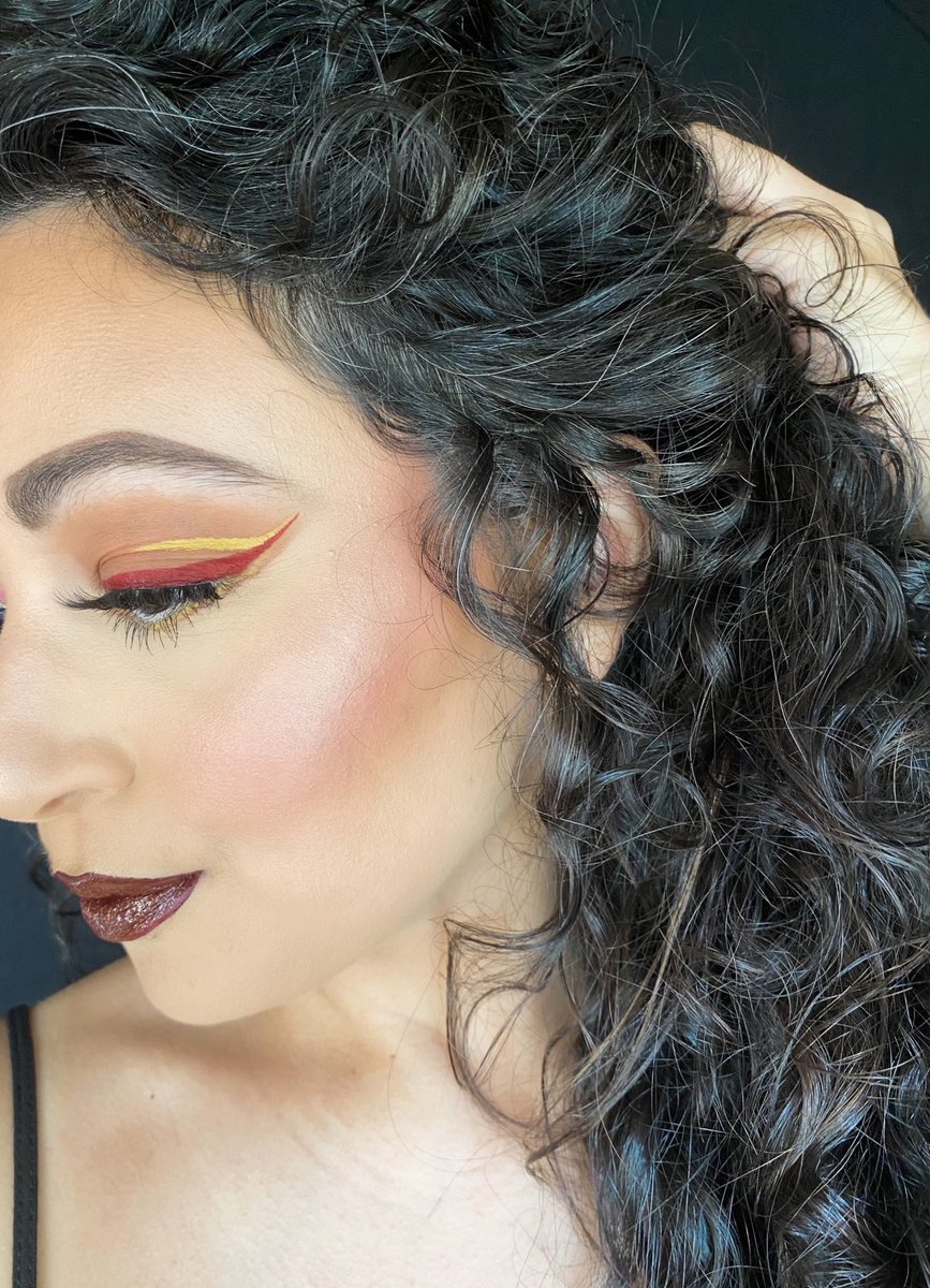 makeupbyrima's tweet photo. Red and Yellow Stripes #colourpopcosmetics liquid eyeliners and matte liquid lipstick in LAX #makeup #wingliner #curls #curlyhair https://t.co/jptv88sJ96