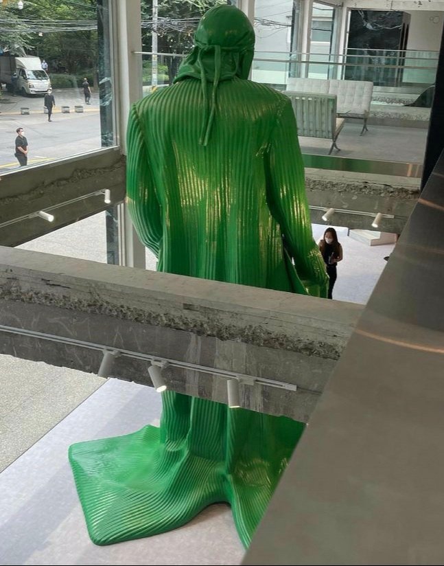 yves tumor statue at louis vuitton store in seoul, south korea