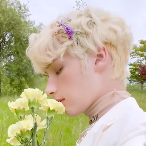 he looks like a little flower fairy