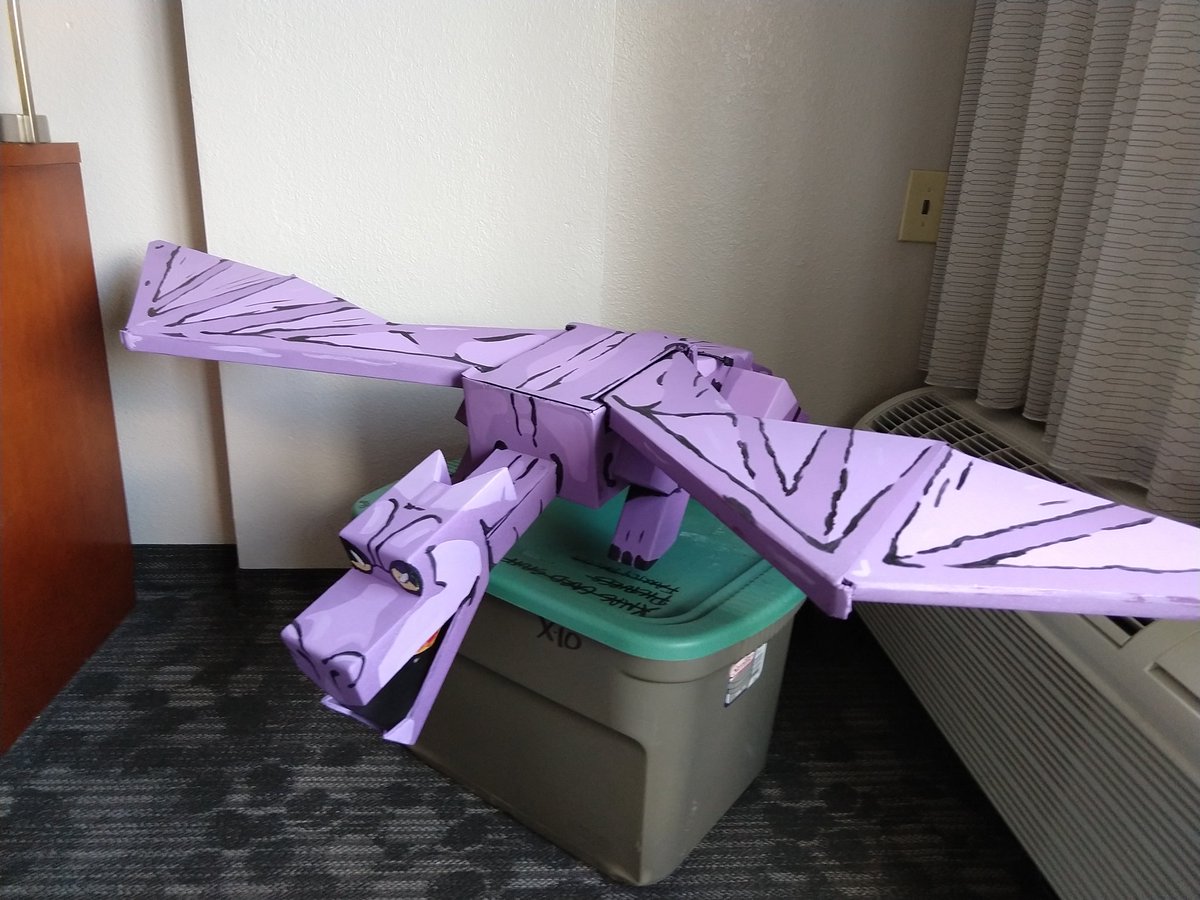 AuburnElvis's tweet photo. @dee_ford Our youngest will be marching in the #DragonCon parade Saturday wearing a harness that suspends this 8 ft up in the air. It's a #BoxHero version of the X-Men's pet dragon, Lockheed. https://t.co/PvshIh4sOg